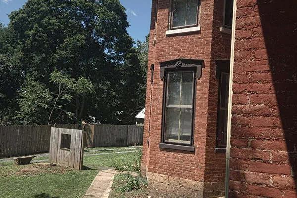 107 E MAIN ST