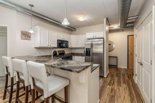 102 N WATER ST 208
