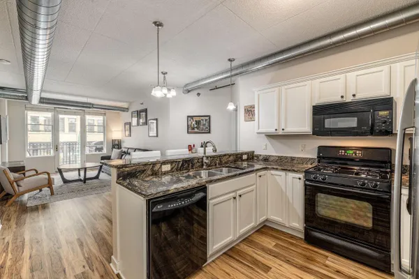102 N WATER ST 208