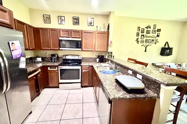 21207 NW 14TH PL 7-28