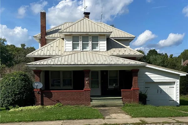 313 E MAIN ST