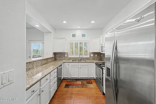 9100 E RAINTREE DR 101
