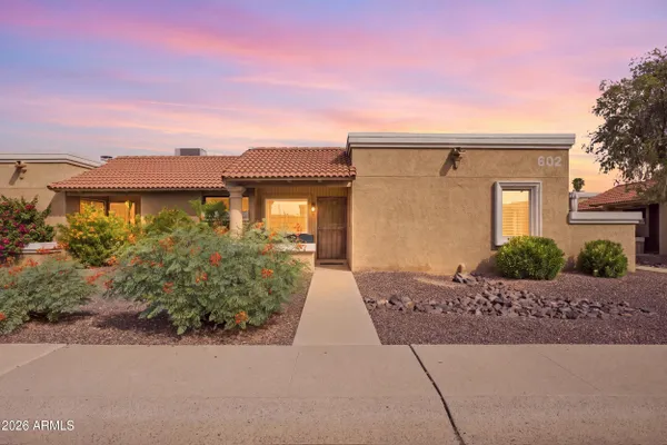 602 W HONONEGH DR 1