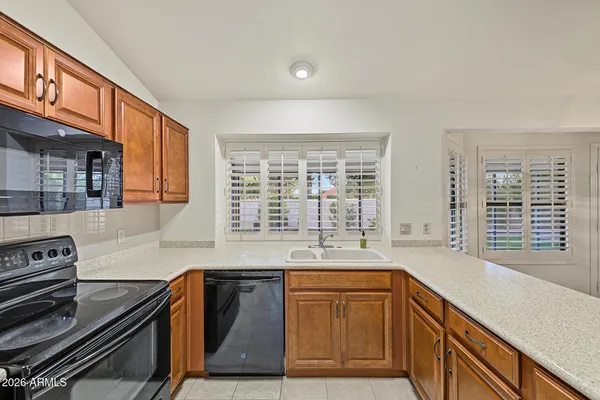 9221 W BEHREND DR