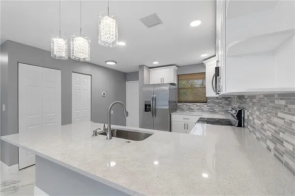 11477 NW 39TH CT 305-1