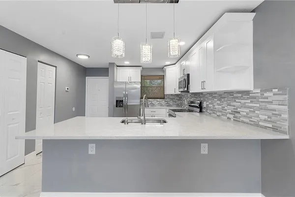 11477 NW 39TH CT 305-1