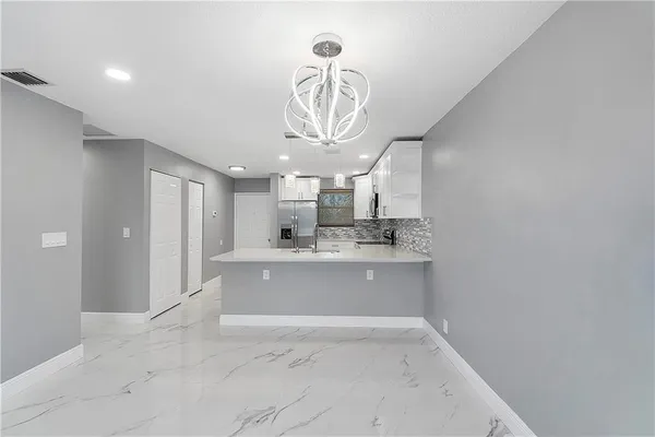 11477 NW 39TH CT 305-1