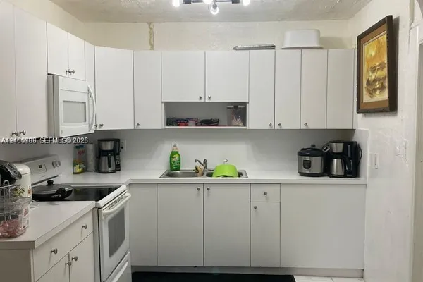 1137 NW 58TH TER