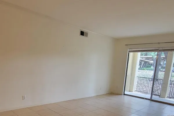 8702 VILLAGE DR 204