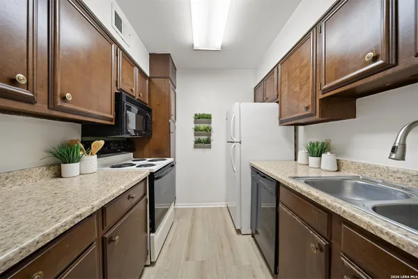 8702 VILLAGE DR 406