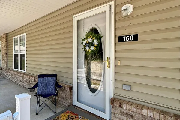 160 WHISPERING PINES DR