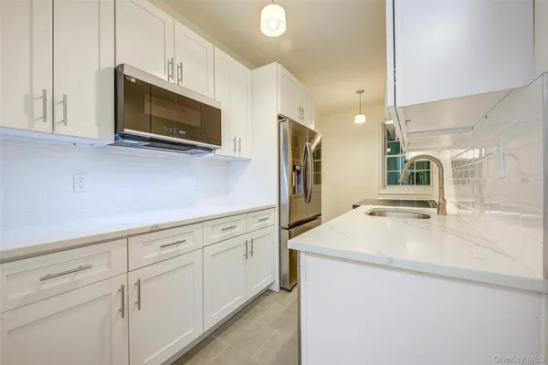 77-12 35TH AVE A11