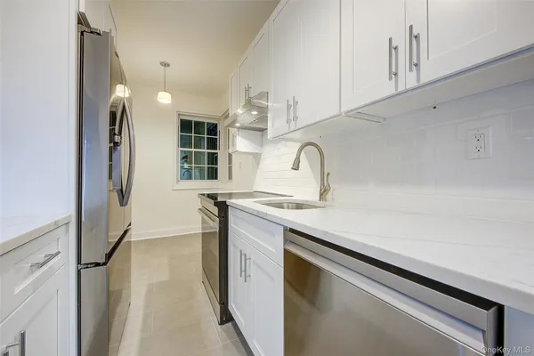 77-12 35TH AVE A11