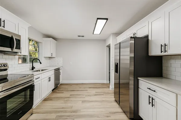 521 N TECUMSEH AVE