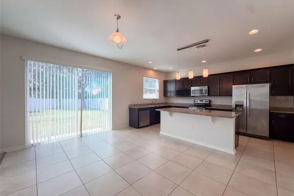 7607 TANGLE RUSH DR