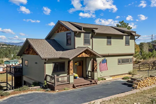 511 WHISPERING PINES DR