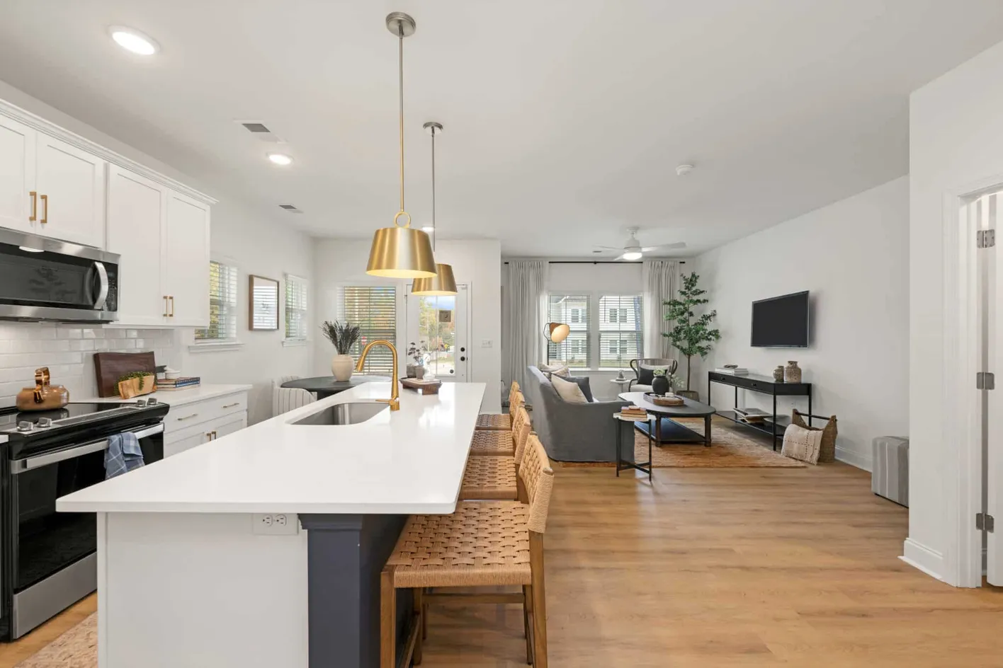 Open-concept kitchen and living area with island seating
