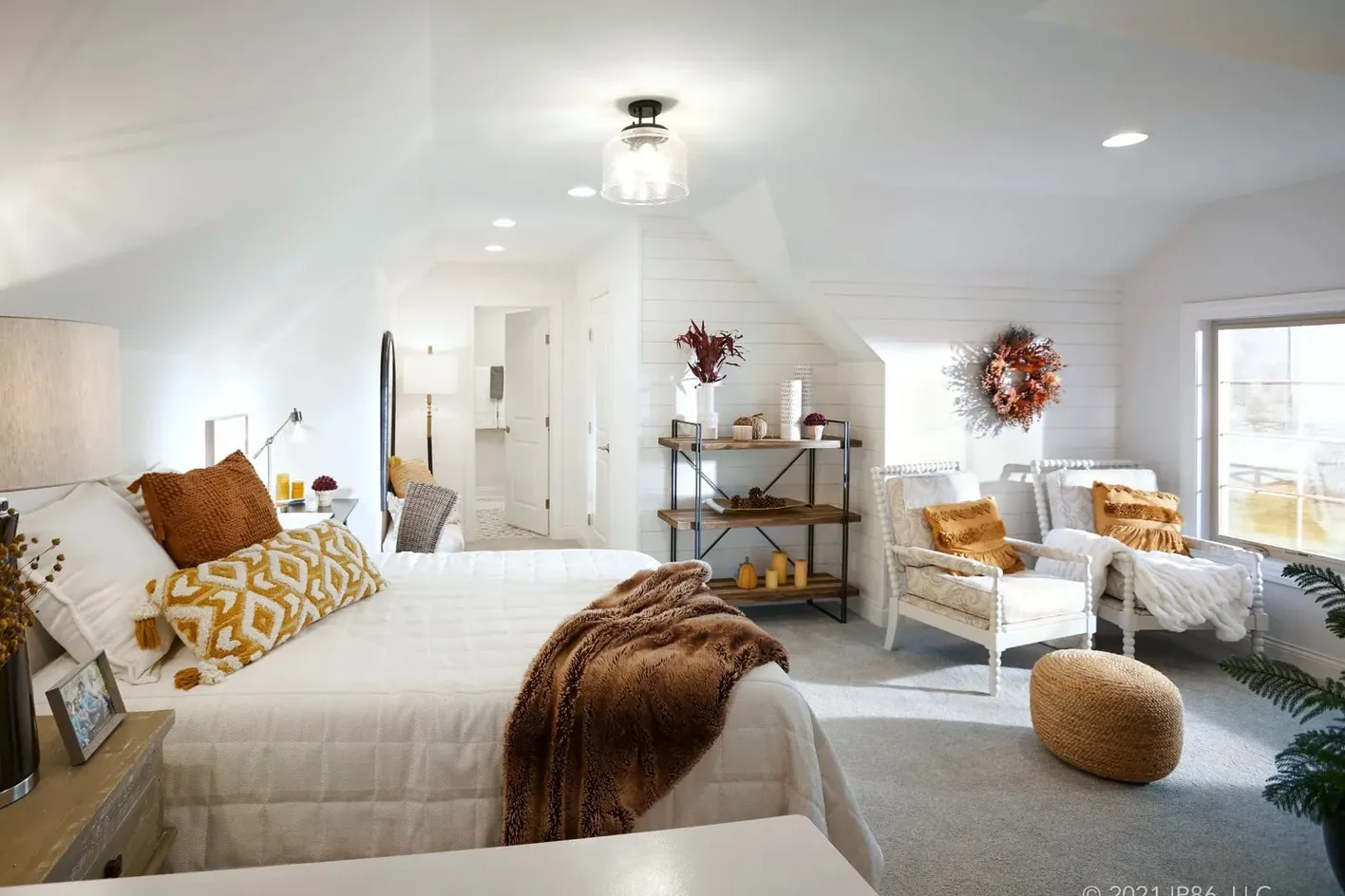 Loft bedroom with seating area
