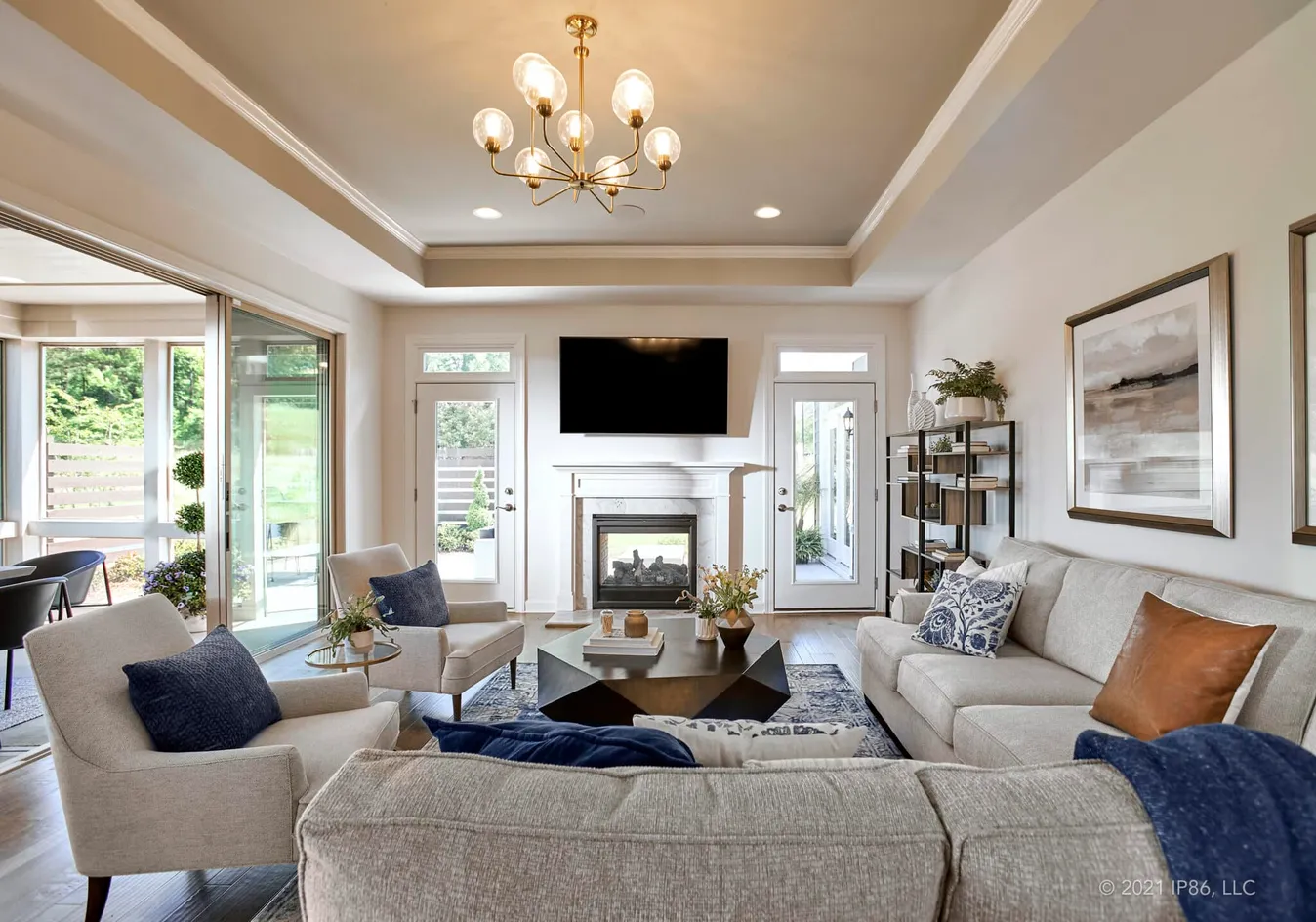 Seamless flow from the living room to the sunroom and outdoor spaces