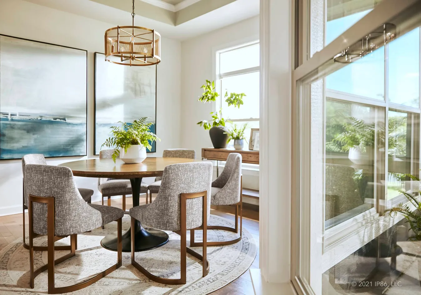 Dedicated dining room with contemporary lighting and designer finishes