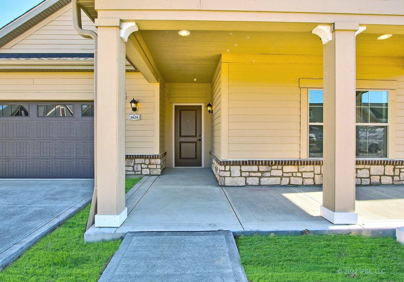 Covered front porch entry with columns