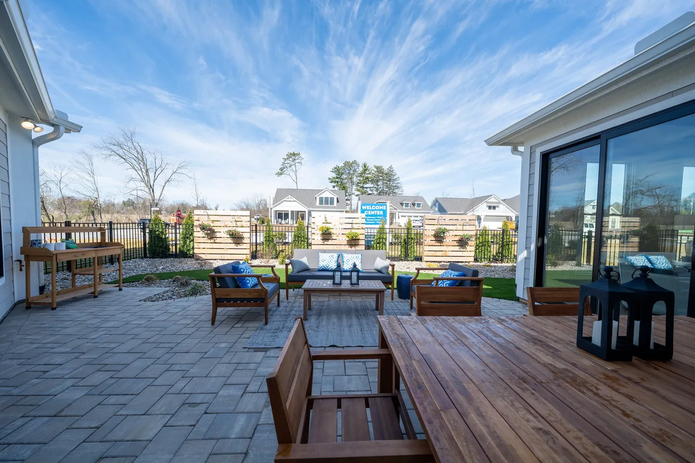 Patio seating facing model homes