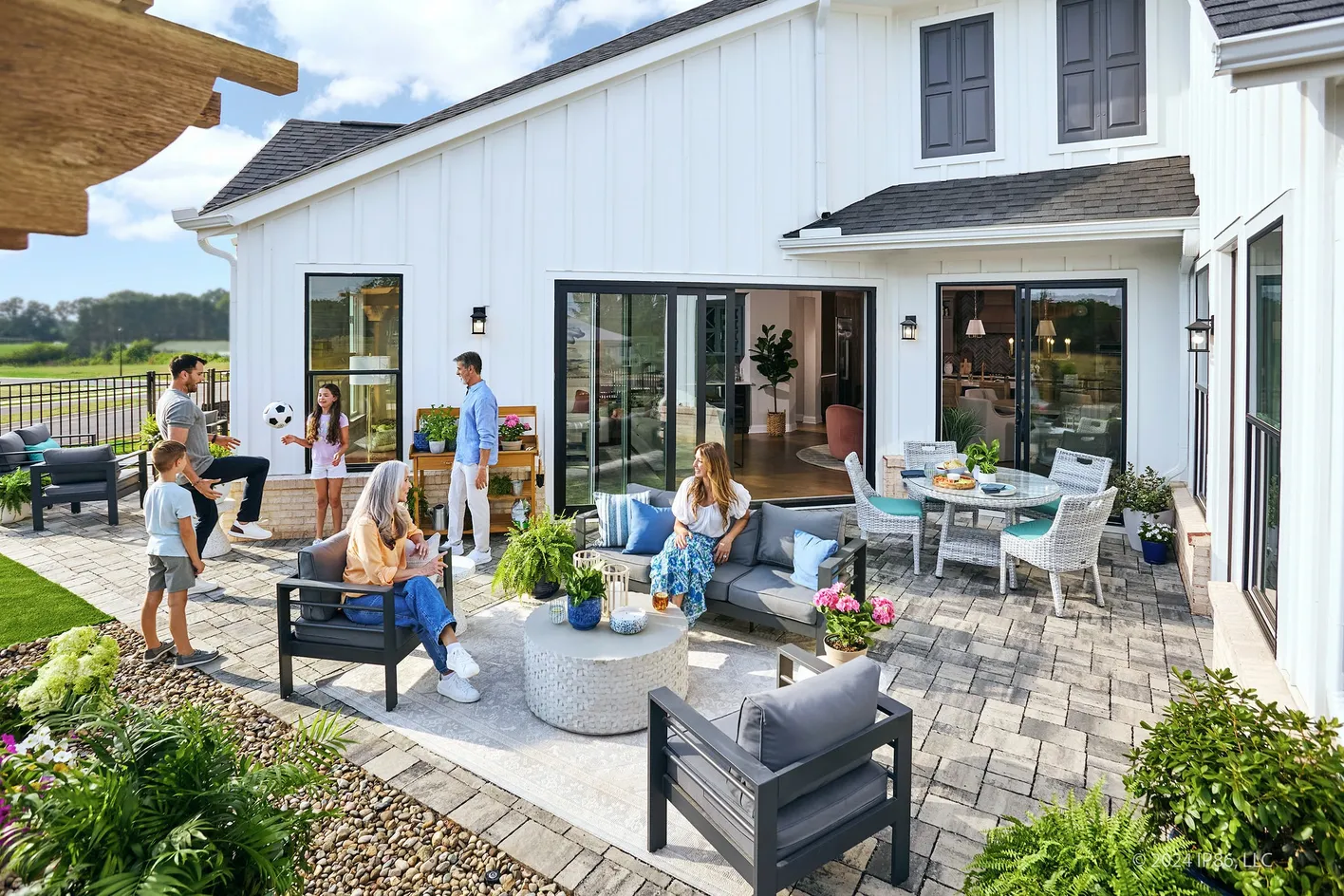Back patio with seating and family