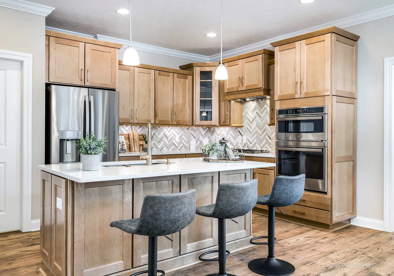 Kitchen with breakfast bar and stainless steel appliances