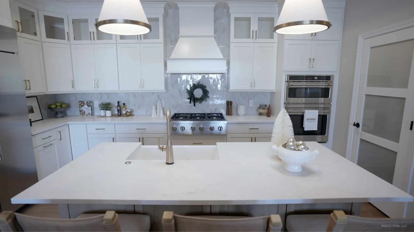 White kitchen with large island seating