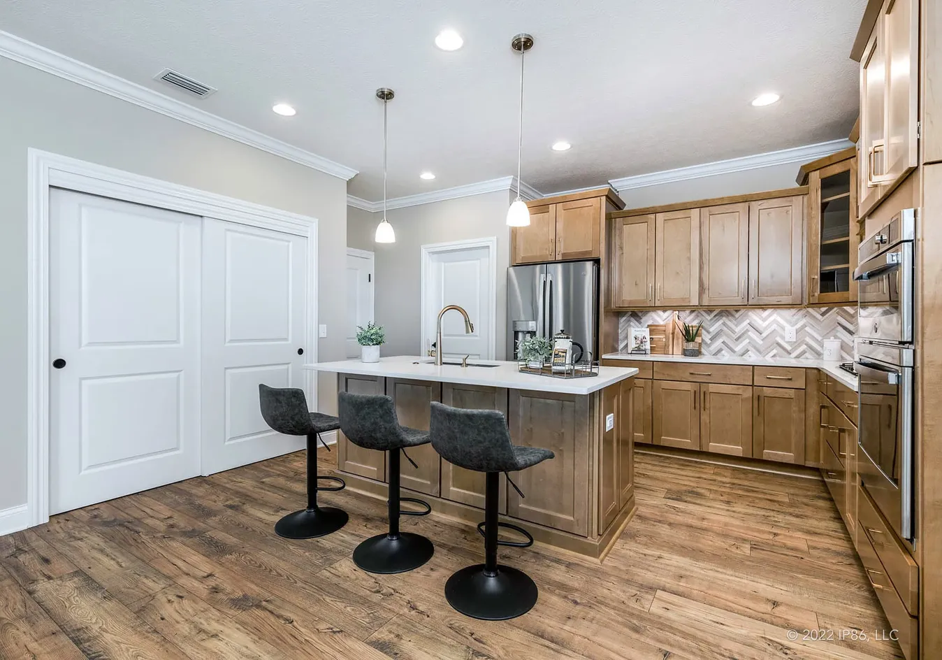 Kitchen and dining area from living room perspective