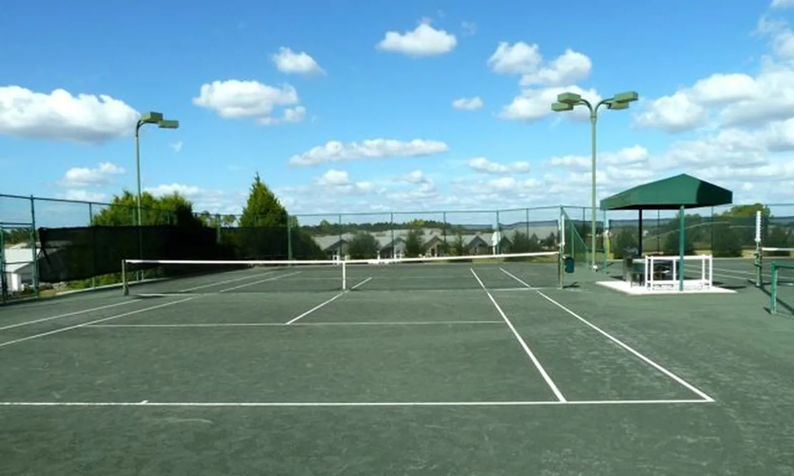 4 Lighted Har-Tru Tennis Courts