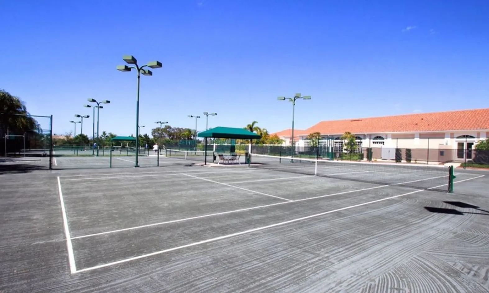 6 Lighted Har-Tru Tennis Courts