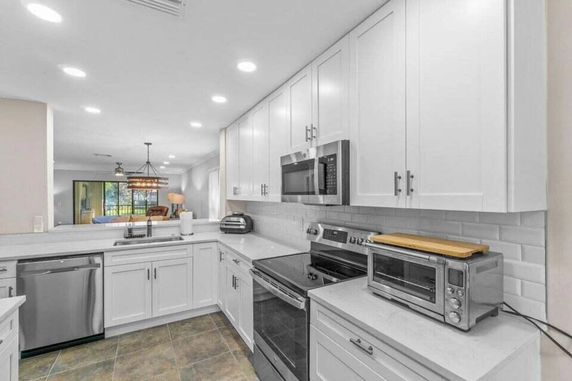 Property Slideshow image 2 of 43 | 25 stratford dr d, Boynton Beach, FL, 33436