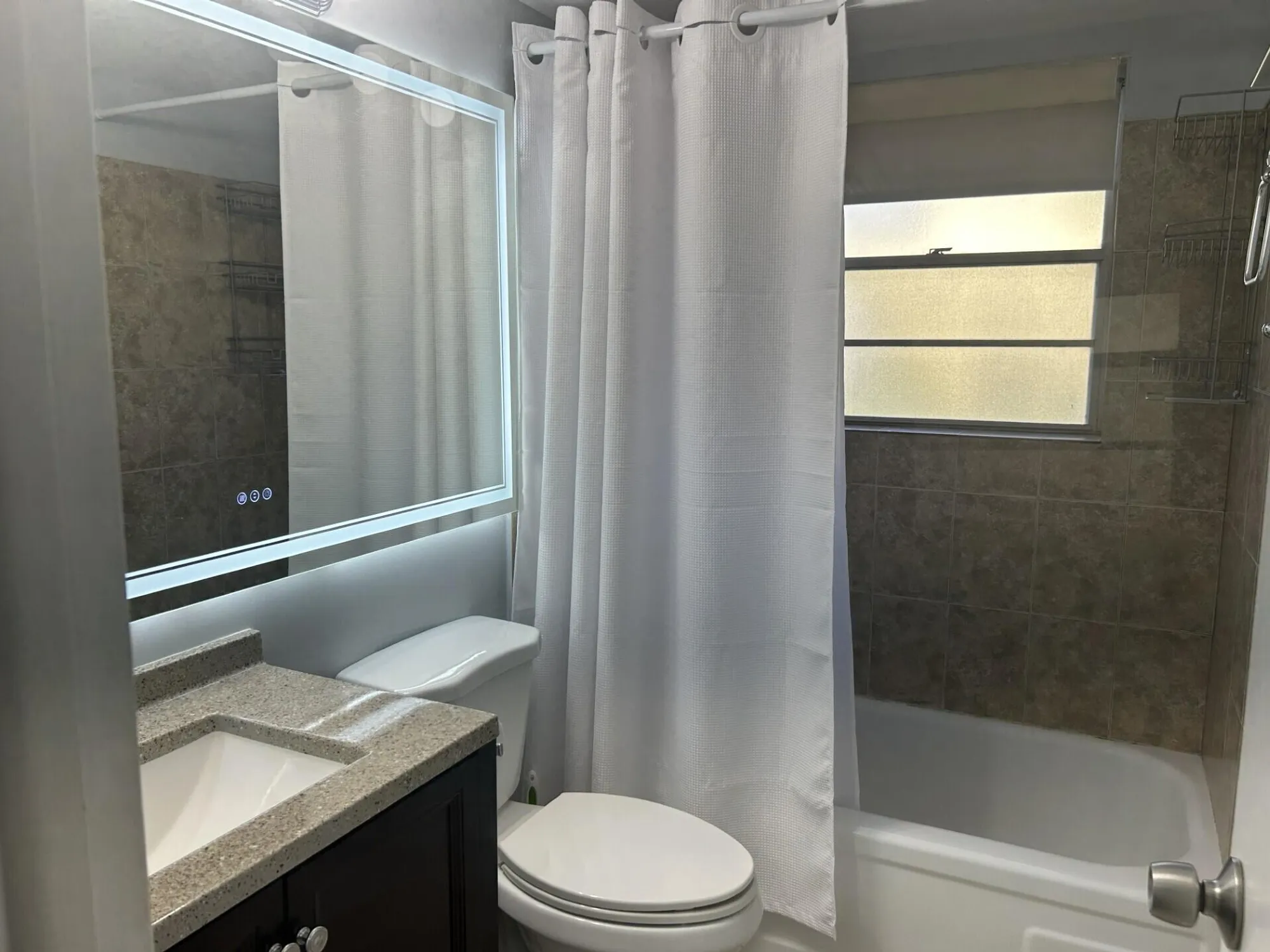 Property Slideshow image 8 of 21 | 105 sheffield e unit e, West Palm Beach, FL, 33417