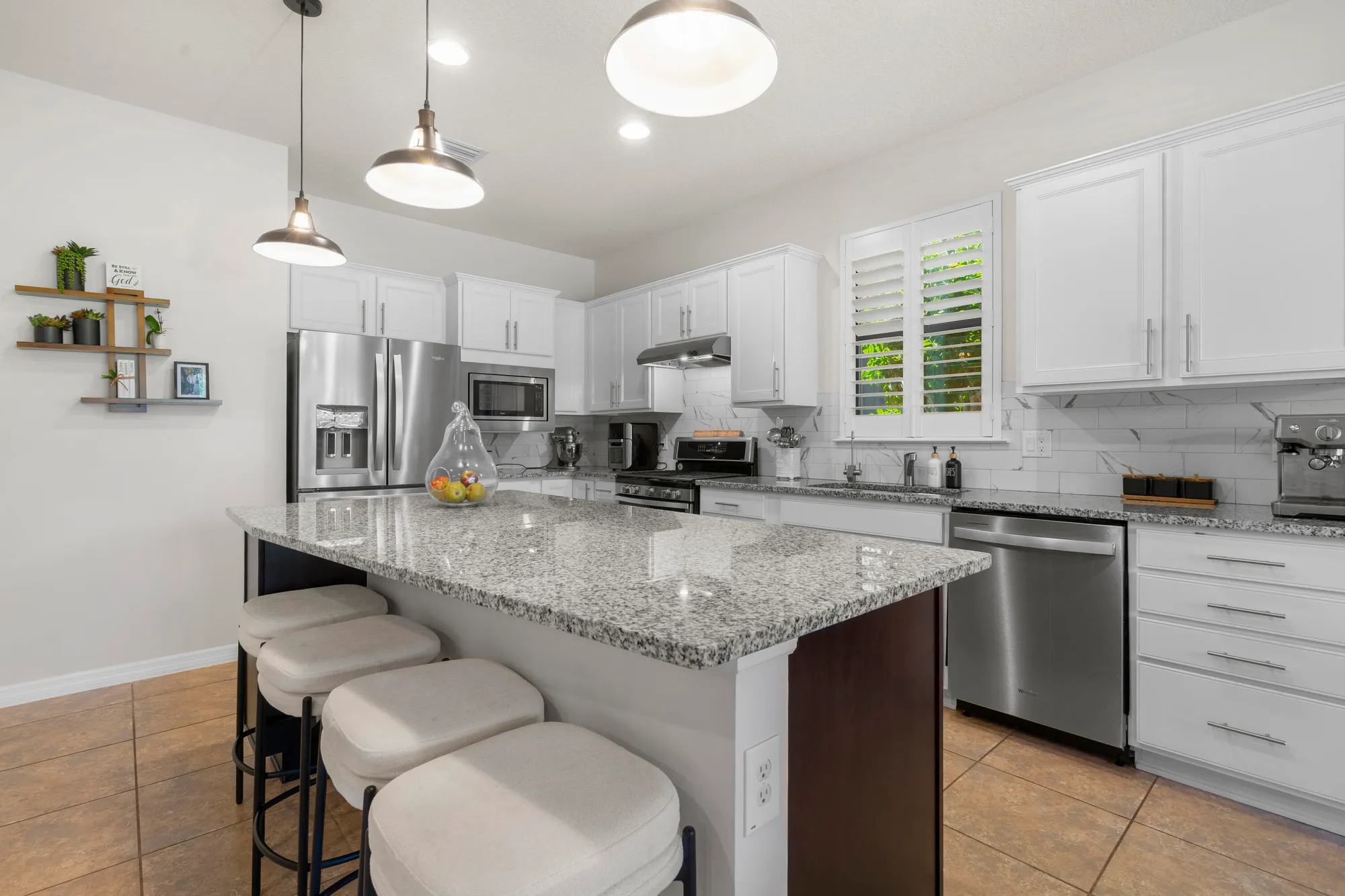 Property Slideshow image 9 of 48 | 560 se monet dr, Port Saint Lucie, FL, 34984