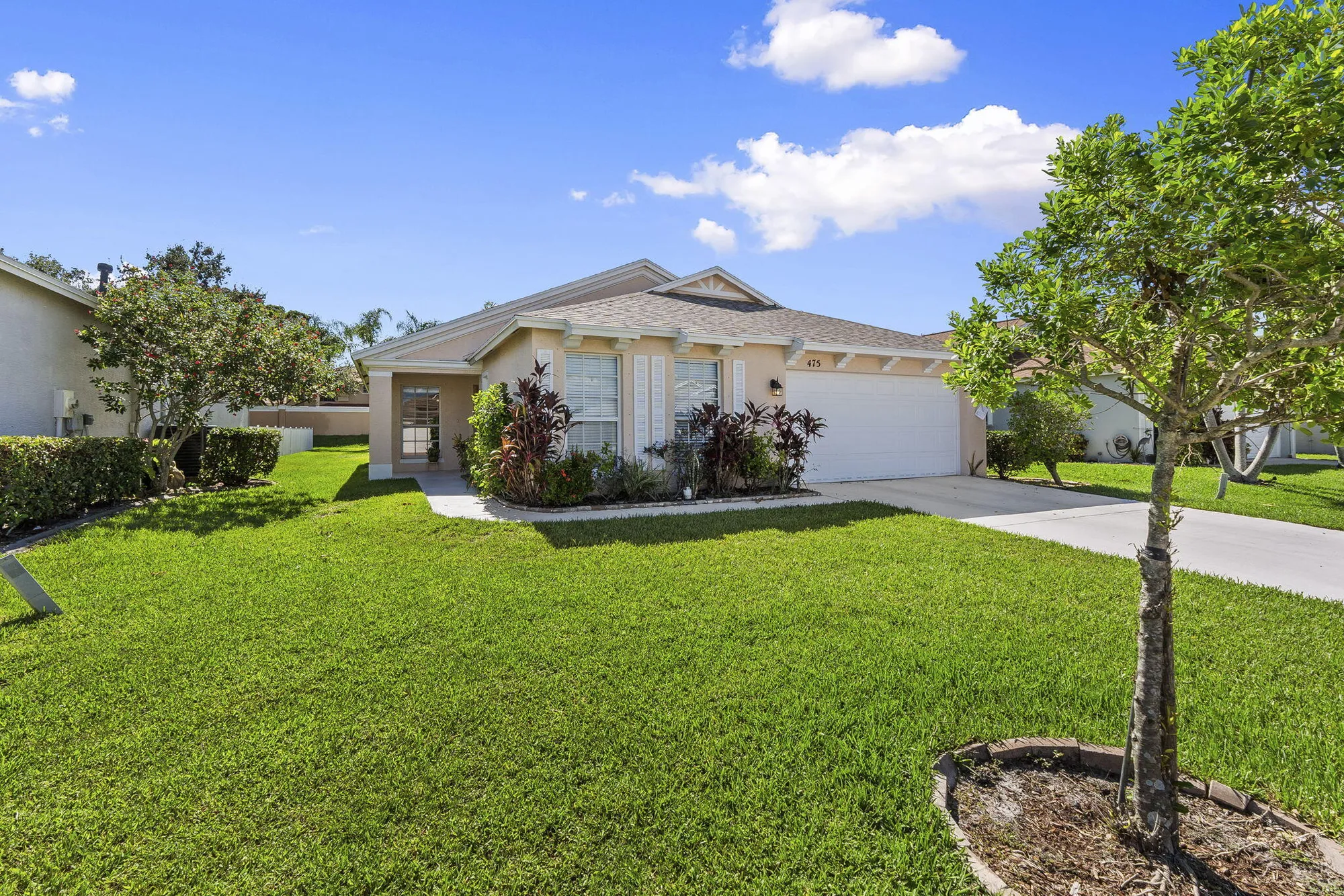 Property Slideshow image 7 of 40 | 475 sw talquin ln, Port Saint Lucie, FL, 34986