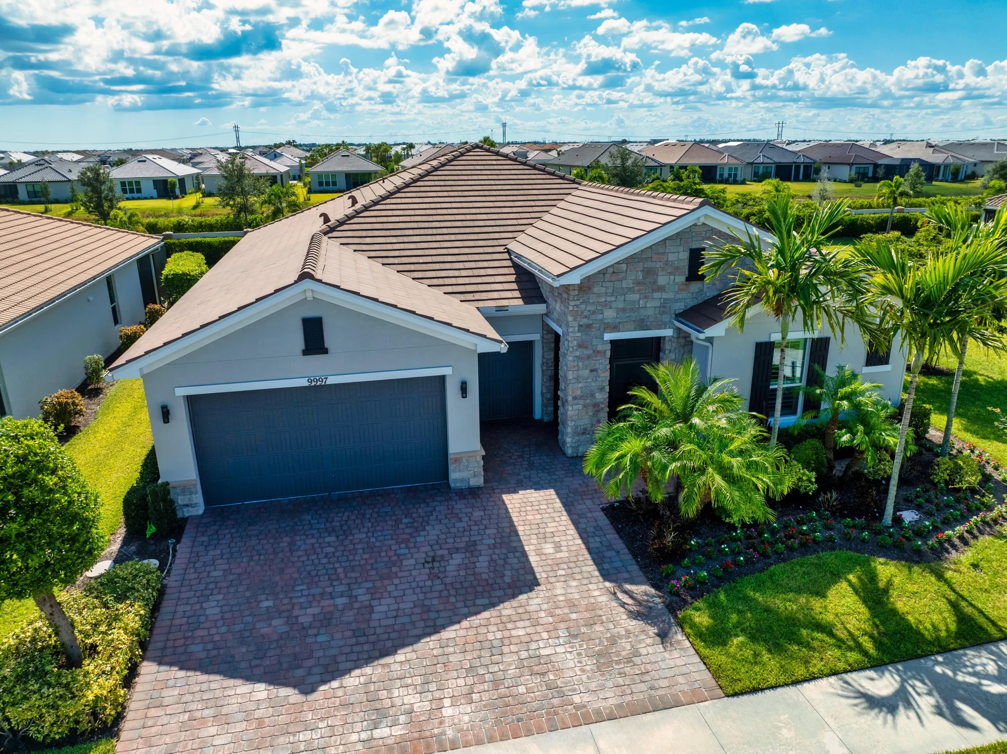 Property Slideshow image 1 of 61 | 9997 sw coral tree cir, Port Saint Lucie, FL, 34987