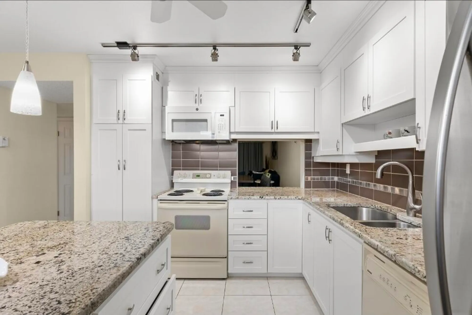 Property Slideshow image 3 of 23 | 6095 n sabal palm blvd apt 210, Tamarac, FL, 33319