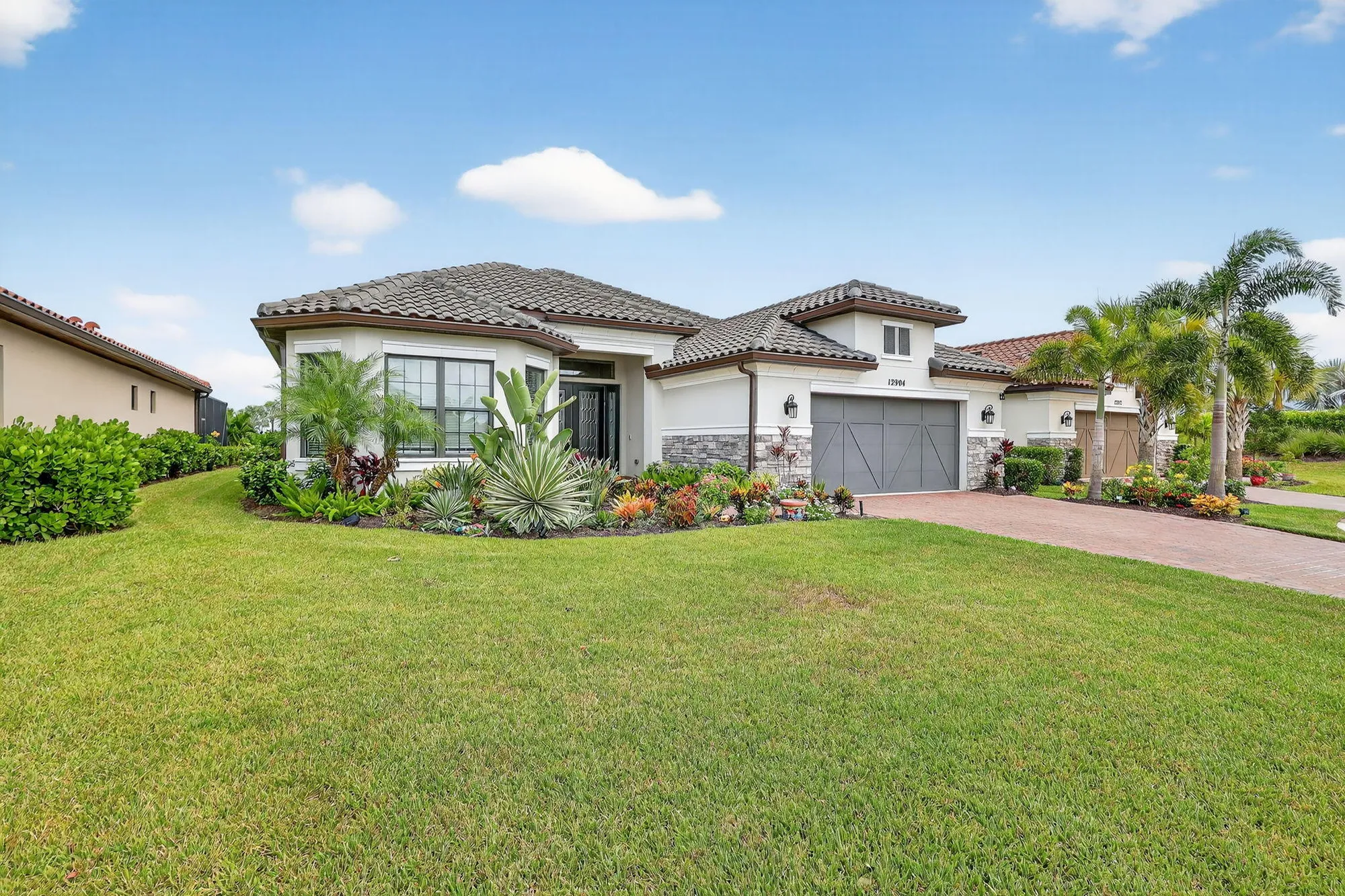 Property Slideshow image 1 of 69 | 12904 sw barelli ct, Port Saint Lucie, FL, 34987