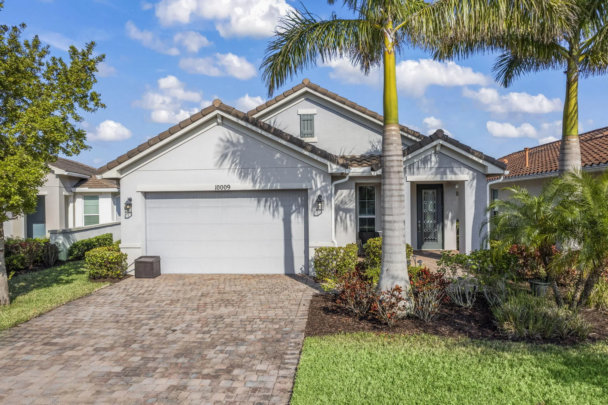 Property Slideshow image 1 of 40 | 10009 sw trumpet tree cir, Port Saint Lucie, FL, 34987