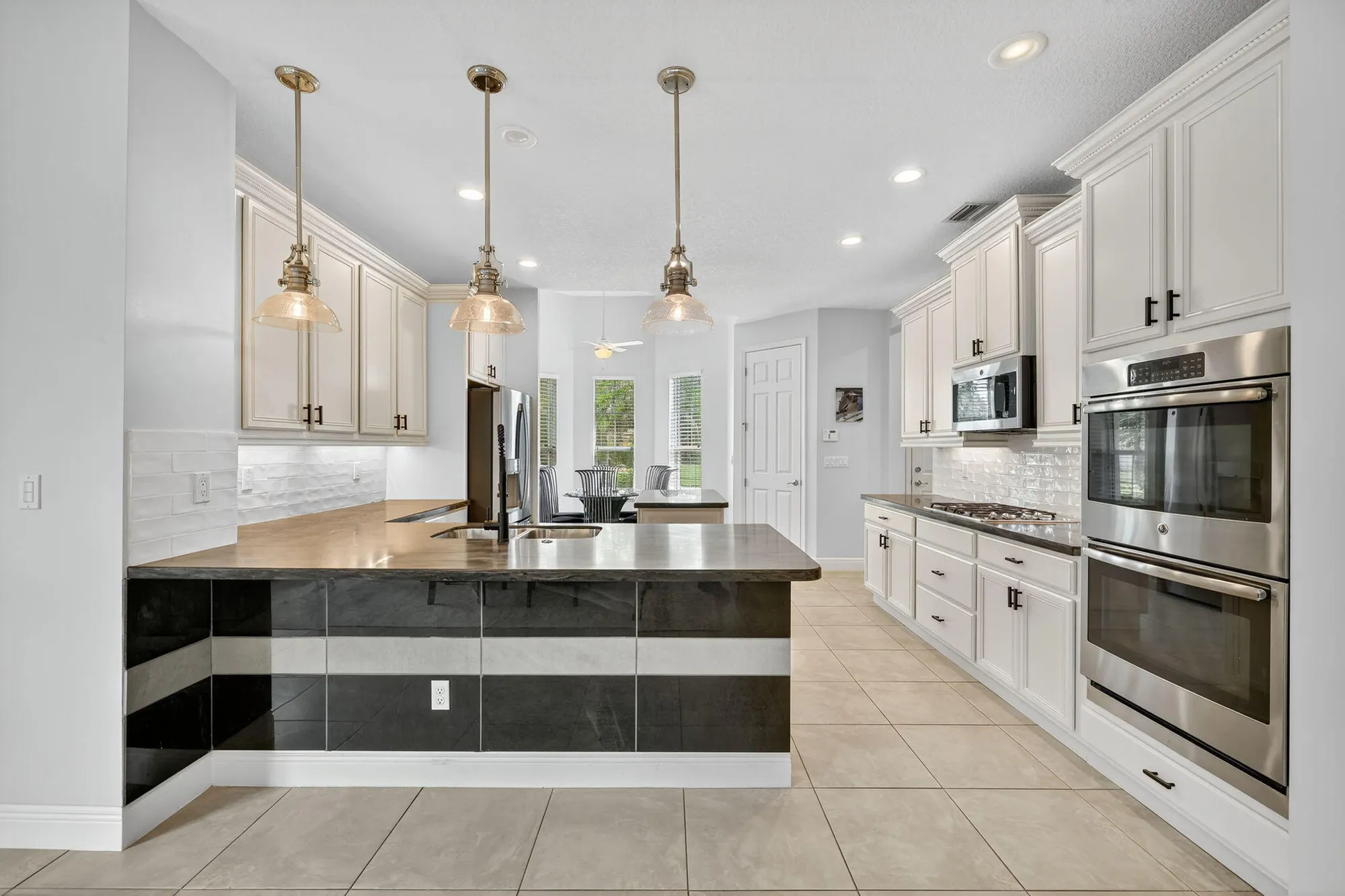 Property Slideshow image 7 of 36 | 9624 sw royal poinciana dr, Port Saint Lucie, FL, 34987