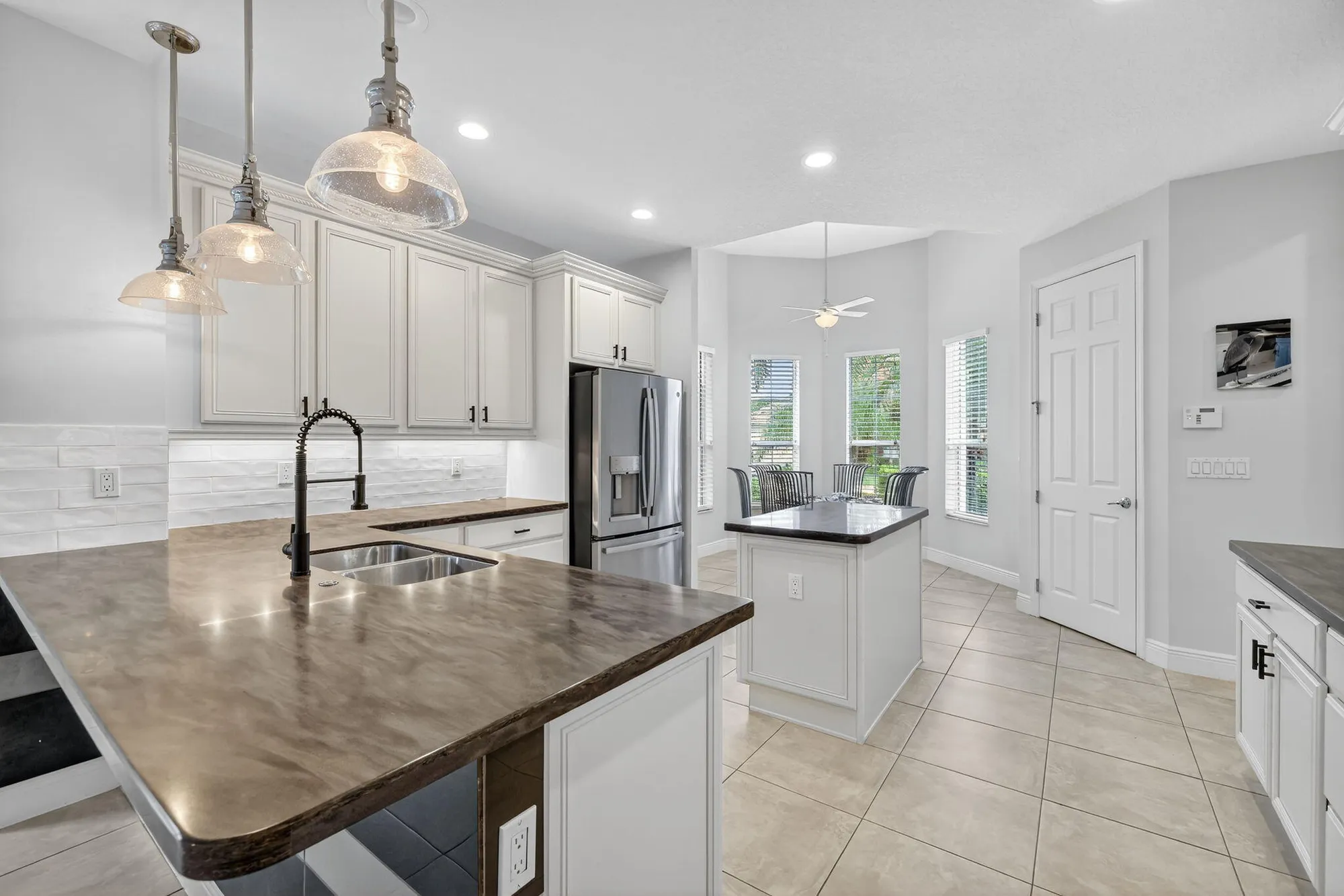 Property Slideshow image 8 of 36 | 9624 sw royal poinciana dr, Port Saint Lucie, FL, 34987