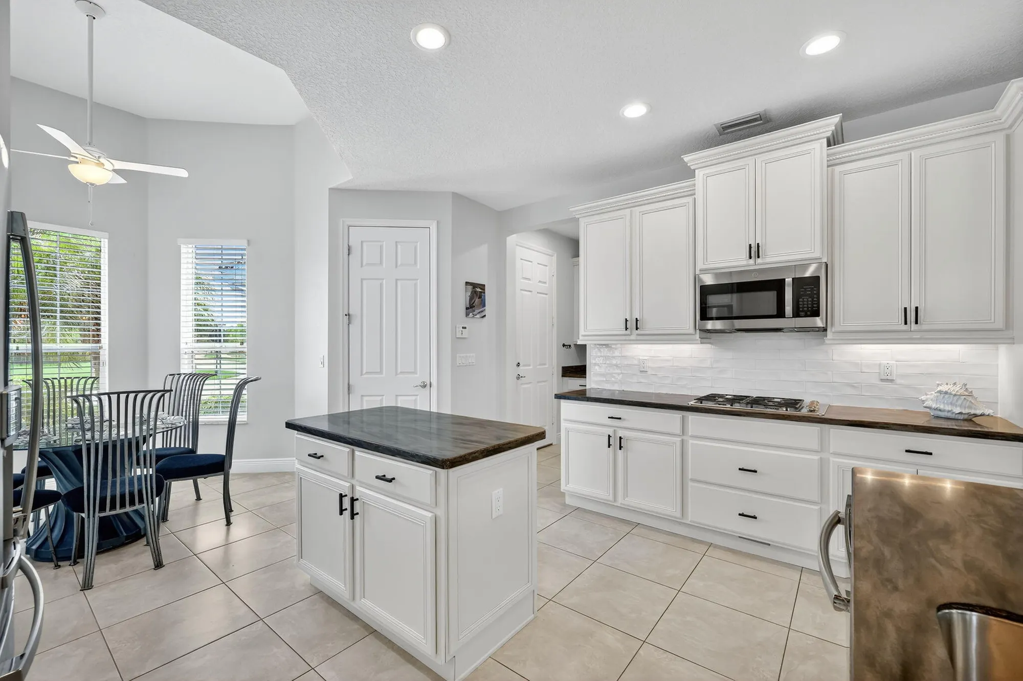 Property Slideshow image 10 of 36 | 9624 sw royal poinciana dr, Port Saint Lucie, FL, 34987