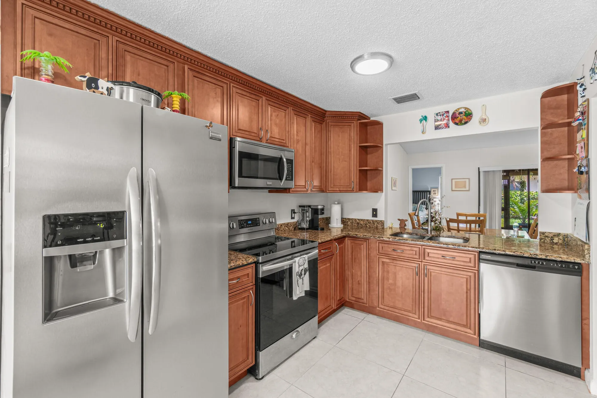 Property Slideshow image 7 of 35 | 6049 ambertree ln, Greenacres, FL, 33463