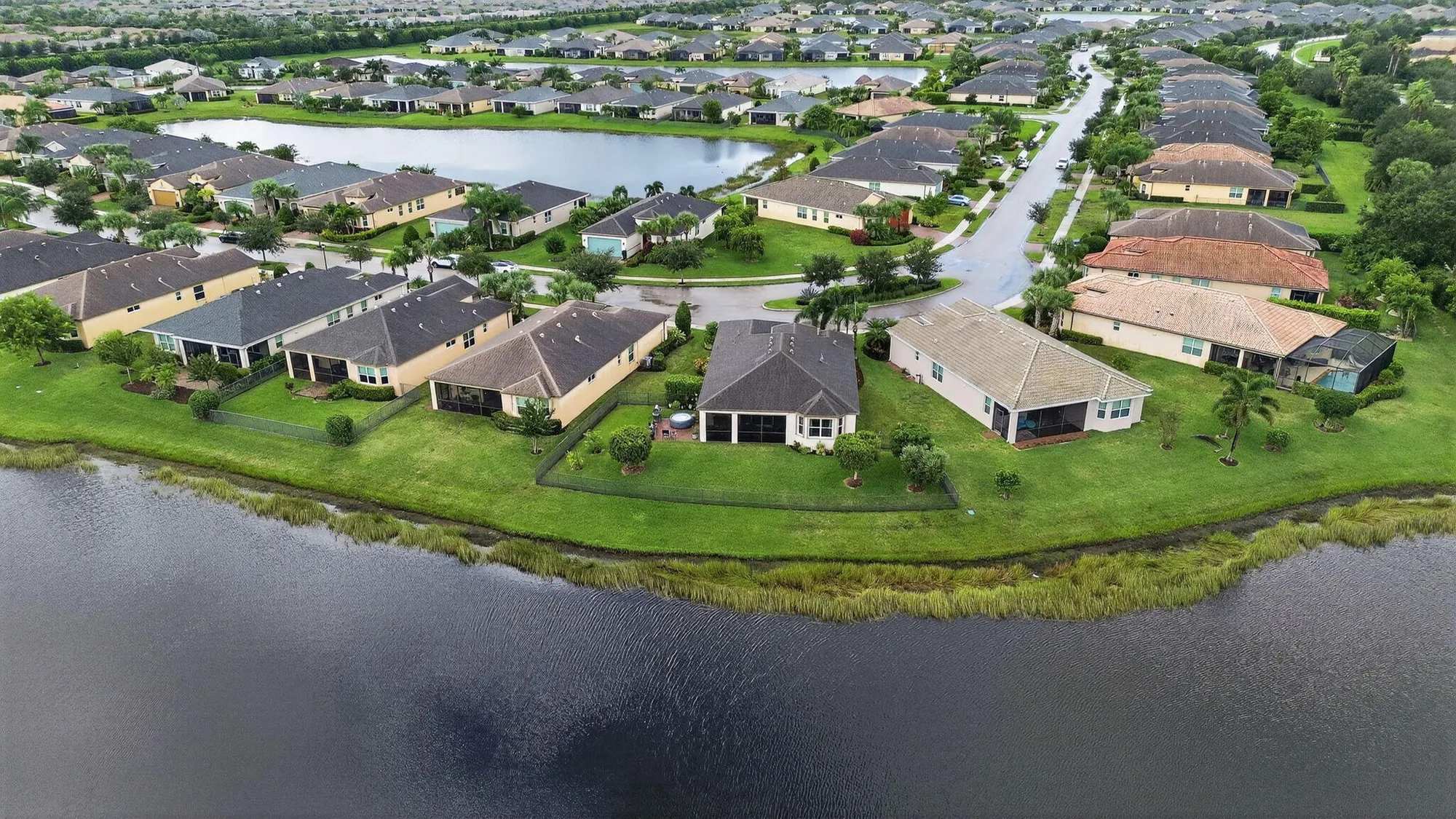 Property Slideshow image 4 of 129 | 11265 sw lake park dr, Port Saint Lucie, FL, 34987
