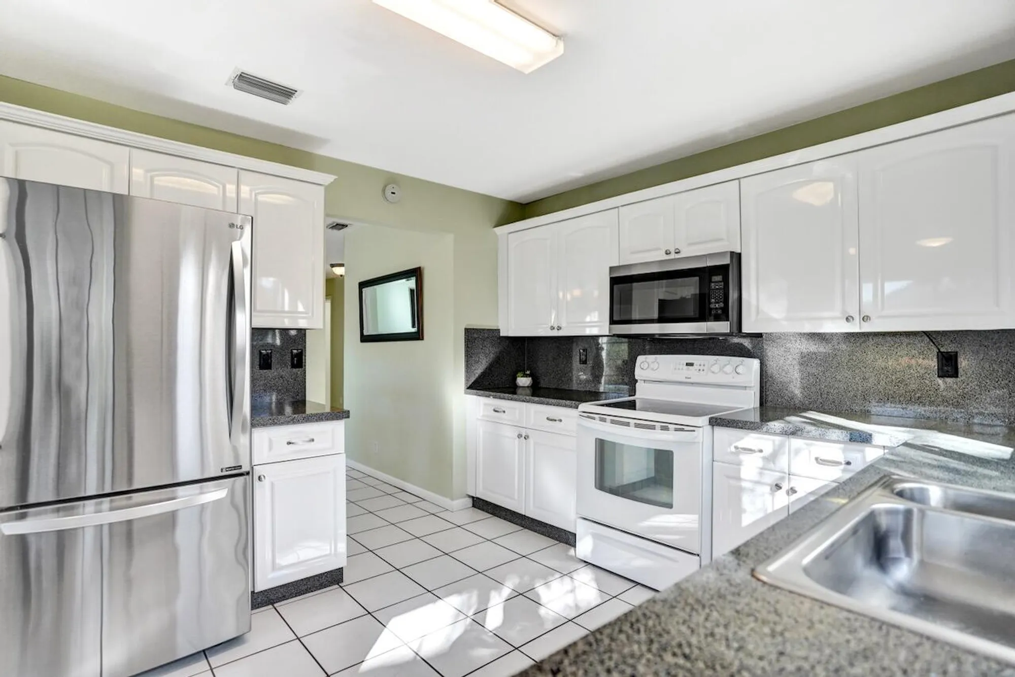Property Slideshow image 27 of 105 | 3373 jog park dr, Greenacres, FL, 33467