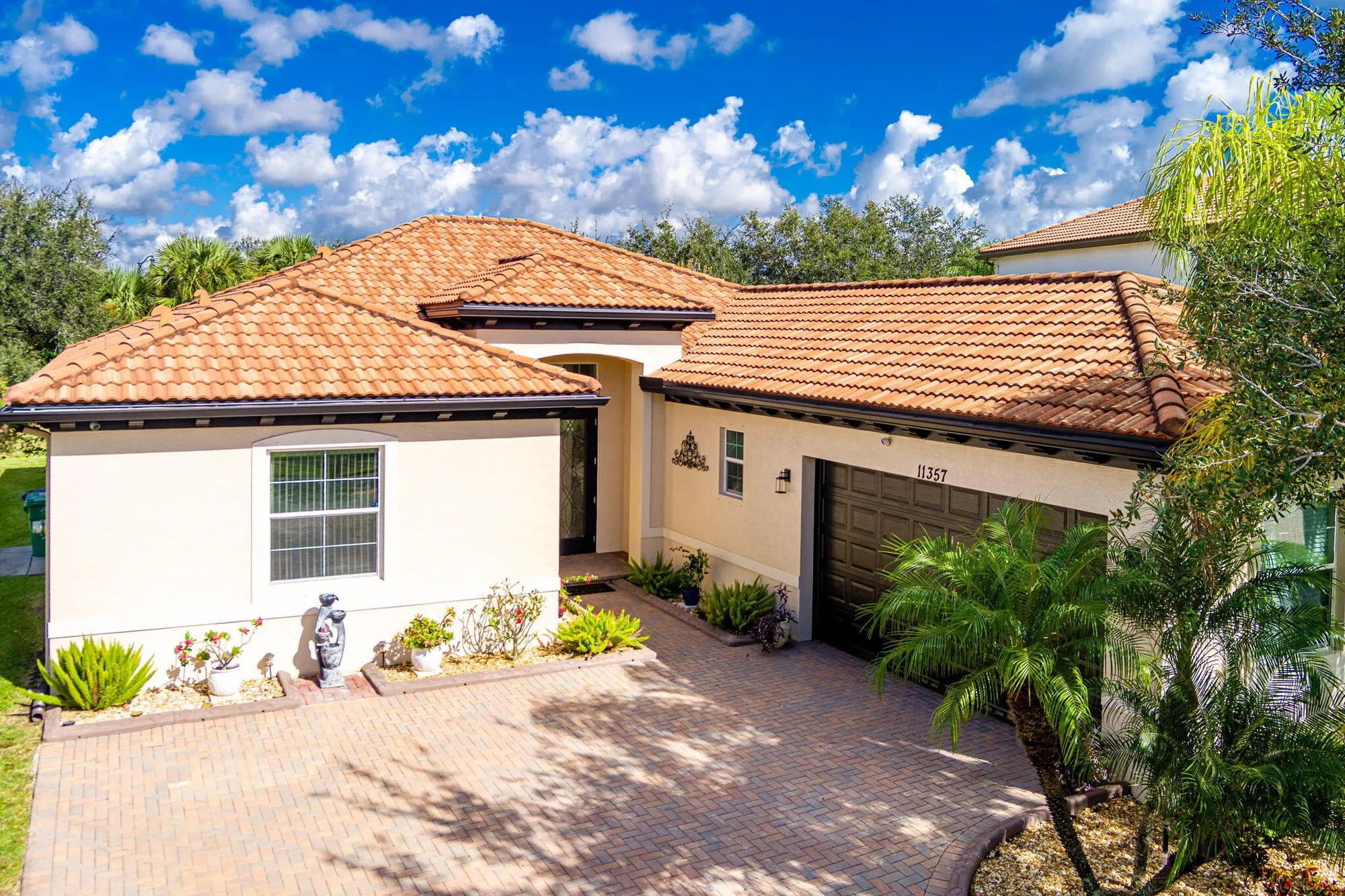 Property Slideshow image 1 of 73 | 11357 sw hillcrest cir, Port Saint Lucie, FL, 34987