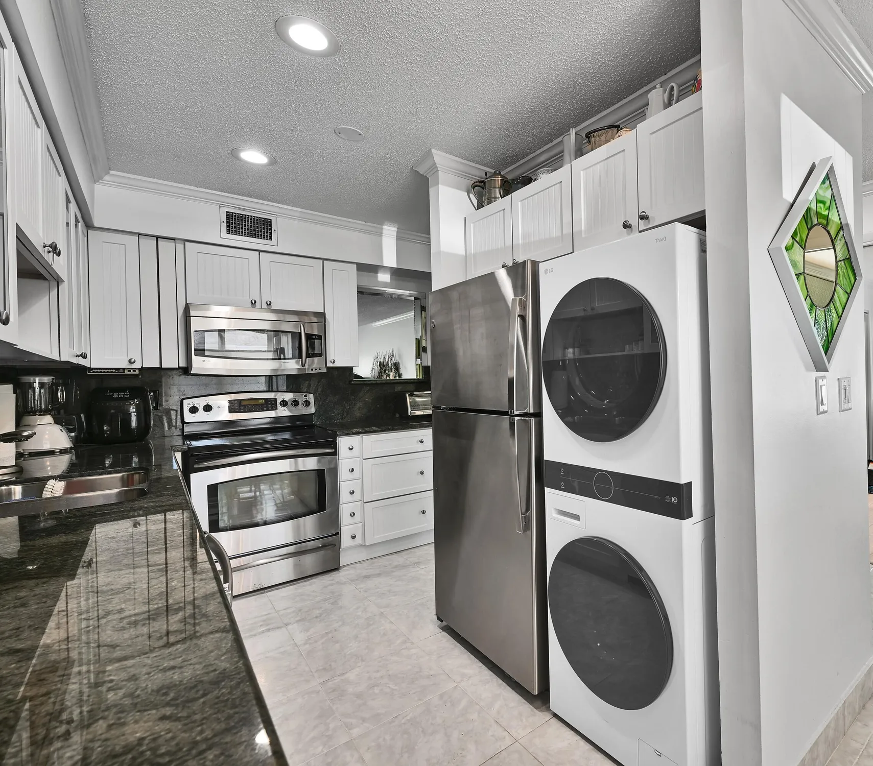 Property Slideshow image 14 of 24 | 13791 flora pl d, Delray Beach, FL, 33484