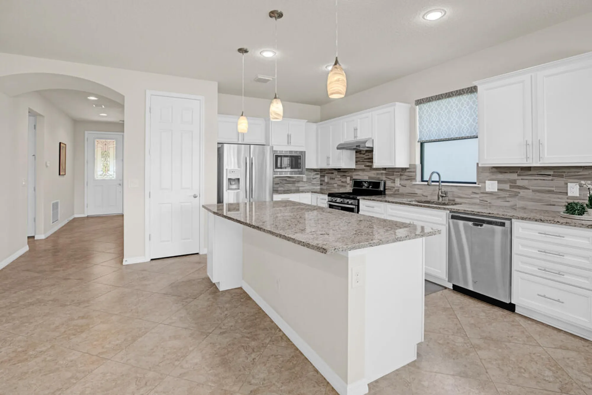 Property Slideshow image 4 of 47 | 649 se monteiro dr, Port Saint Lucie, FL, 34984