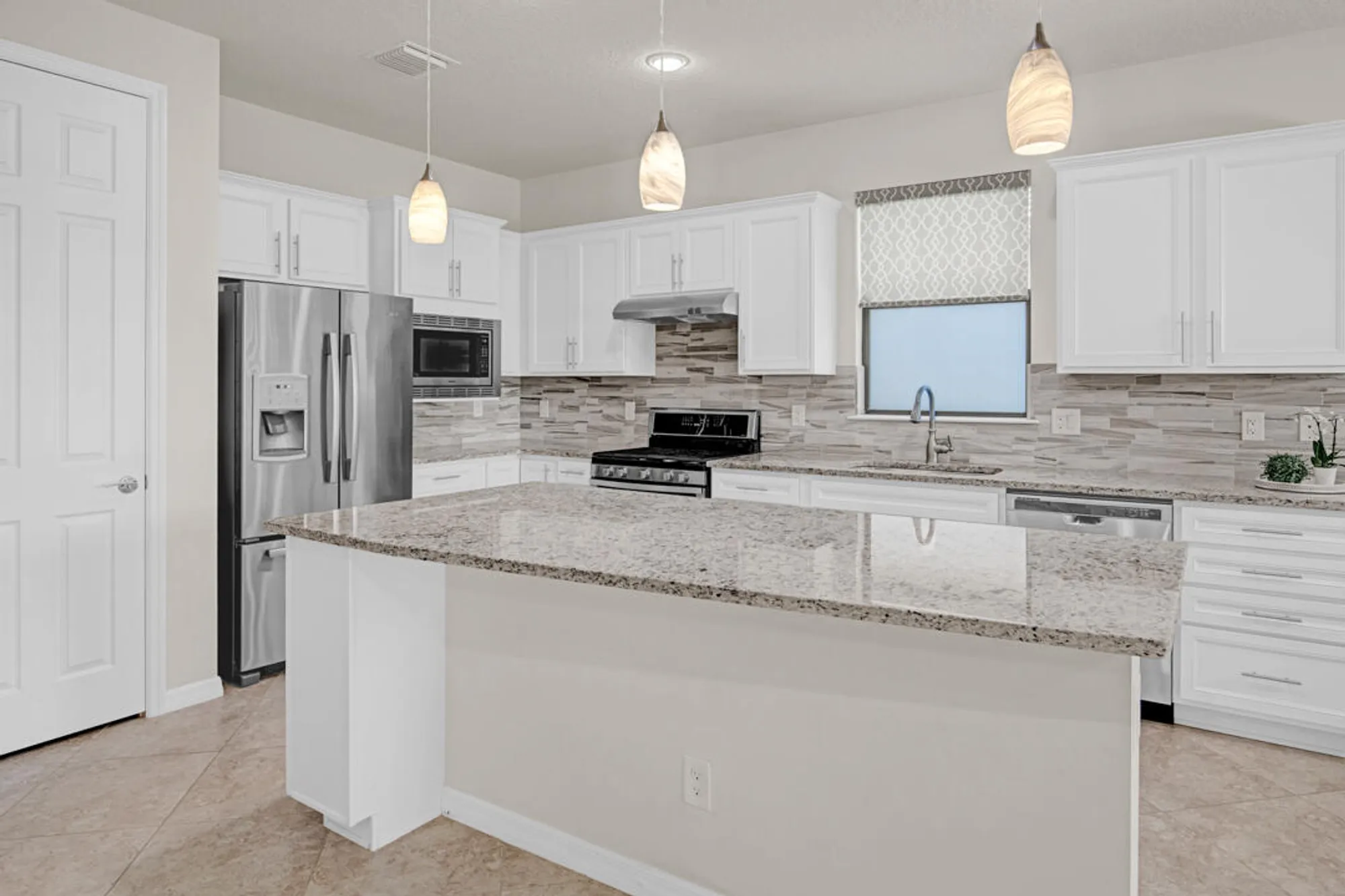 Property Slideshow image 7 of 47 | 649 se monteiro dr, Port Saint Lucie, FL, 34984